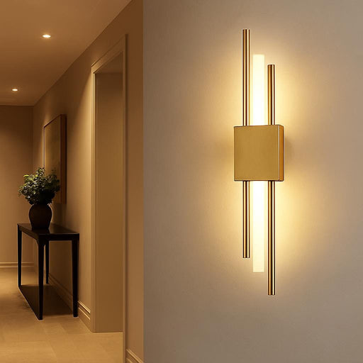 An artistic interior shot featuring the Lucas Wall Light Gold installed in a stylish hallway, with subtle shadows and warm white illumination creating a luxurious and modern atmosphere, complemented by elegant decor elements.