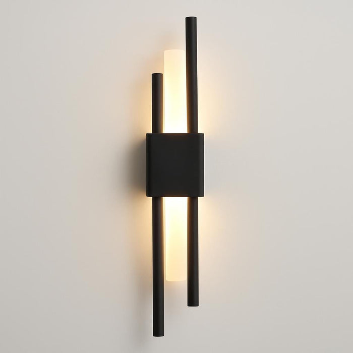 A studio shot of the Lucas Wall Light focused on the high-quality matte black finish and illuminated panels, with a clean, minimalistic backdrop to emphasize its modern design.