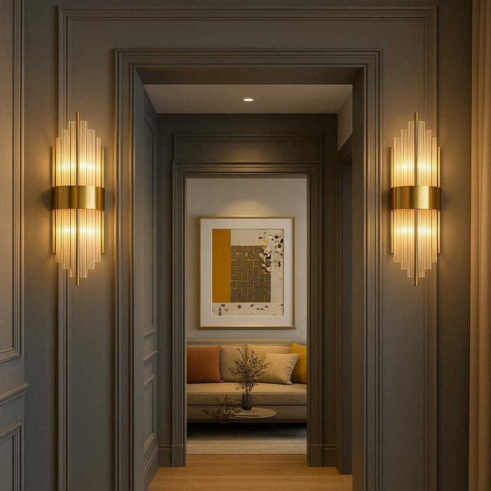 An artistic scene showing a pair of Addo Wall Lamps installed symmetrically on either side of a doorway or artwork in a stylish hallway, emphasizing their role in creating a balanced, sophisticated lighting arrangement in a modern home.