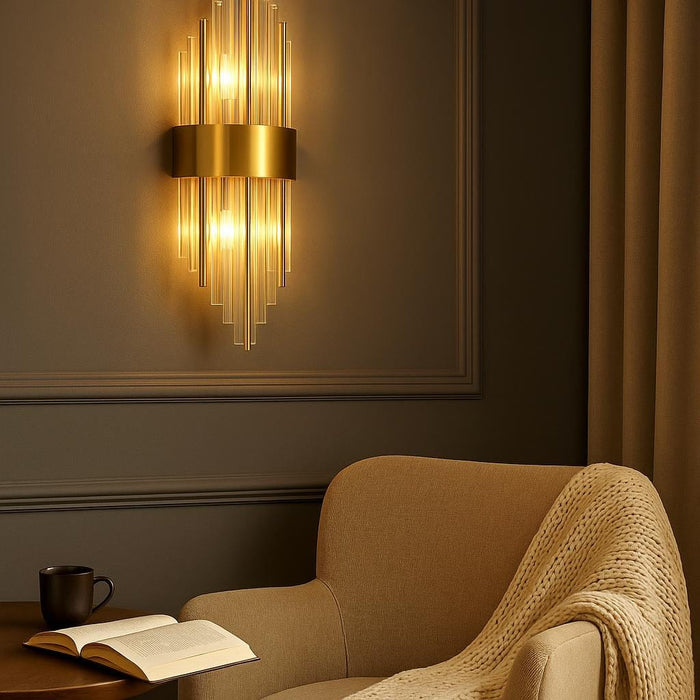 An interior shot of a cozy reading nook featuring the Addo Wall Lamp mounted above a comfortable armchair, casting warm light over a book and a small side table, showcasing its functionality and aesthetic appeal in a relaxed setting.