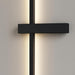 Close-up of the Dario LED wall light showcasing its matte black finish and architectural linear design, highlighting the high-quality aluminum material and the perpendicular element.