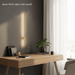 You will be generating high-quality product photos for an online stores product page. The product images should closely match the original products.
      Here is the prompt (IMPORTANT!): """An artistic lifestyle scene featuring the James Wall Light Gold (